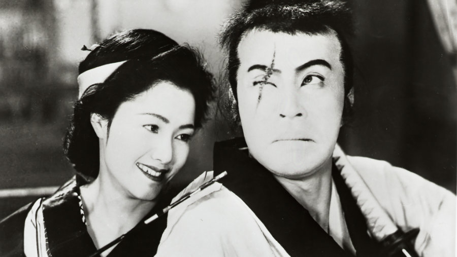 Okochi Denjiro as Tange Sazen and Shinbashi Kiyozō as Ofuji in The Million Ryo Pot (also known as Tange Sazen and the Pot Worth a Million Ryō (Japanese: 丹下左膳余話 百萬両の壺, Hepburn: Tange Sazen Yowa: Hyakuman Ryō no Tsubo) (1935)